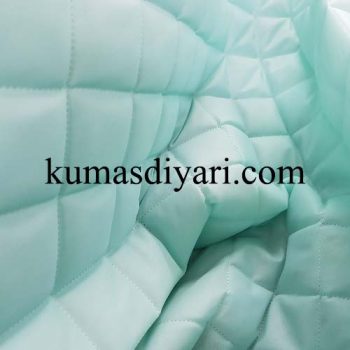 aqua green quilted fabric