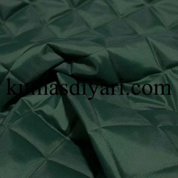 dark green quilted fabric